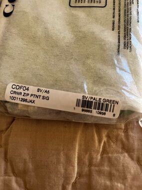 Coach Pale Green Corner Zip Wristlet